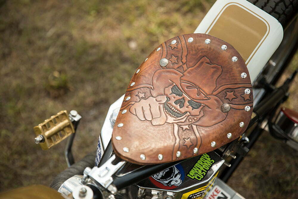 motorcycle seat engraved with skull